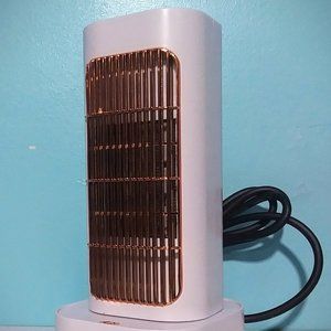 New Portable Compact Heater w/ Ceramic Heating, Rotation & Tip Over Protection